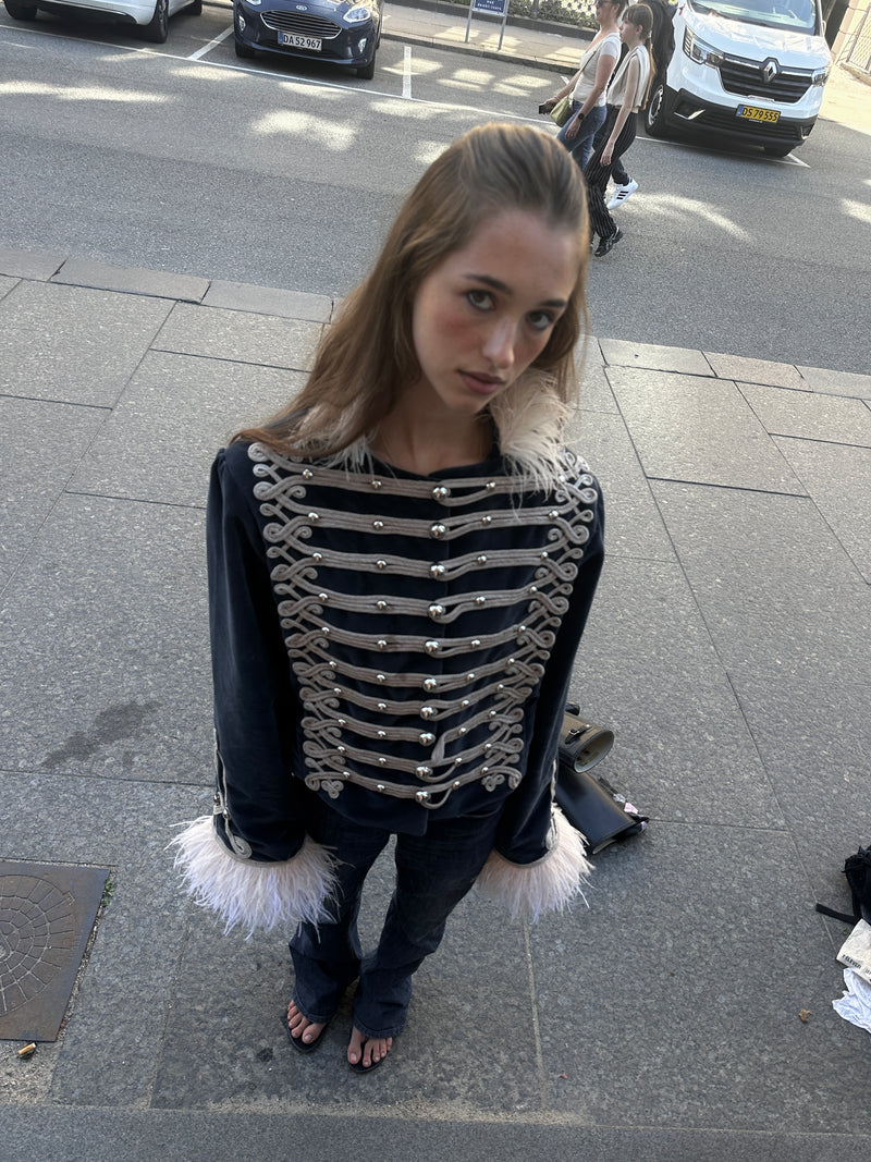 The feather jacket.
